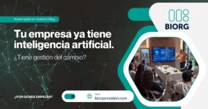 Equipo de una organización trabajando junto a una herramienta de inteligencia artificial, gestión del cambio BIORG